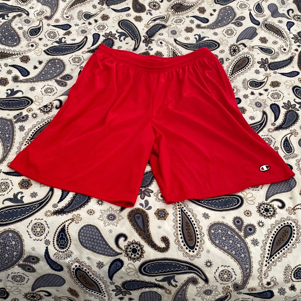 Mens size large red basketball shorts. Champion brand. With pockets.